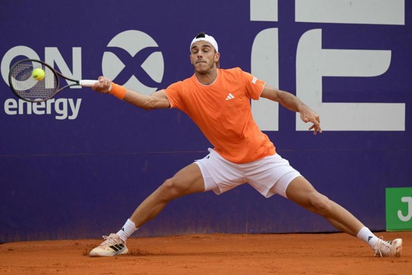 Argentina's Francisco Cerundolo returns the ball to Italy's Luciano Darderi (not in frame) during their ATP 250 Argentina Open final match in Buenos Aires on February 15, 2026. JUAN MABROMATA / AFP