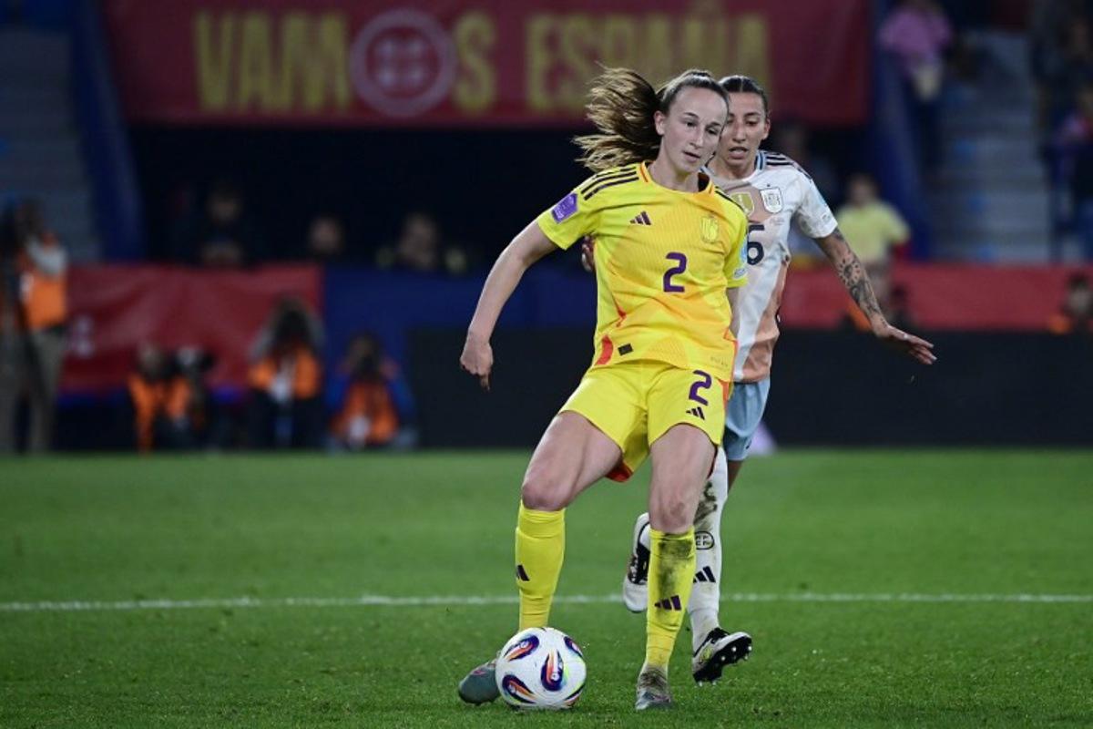 Belgium's defender #02 Sari Kees is challenged by Spain's defender #16 Sheila Garcia during the UEFA Women's Nations League group A3 football match between Spain and Belgium at Ciutat de Valencia stadium in Valencia on February 21, 2025. JOSE JORDAN / AFP