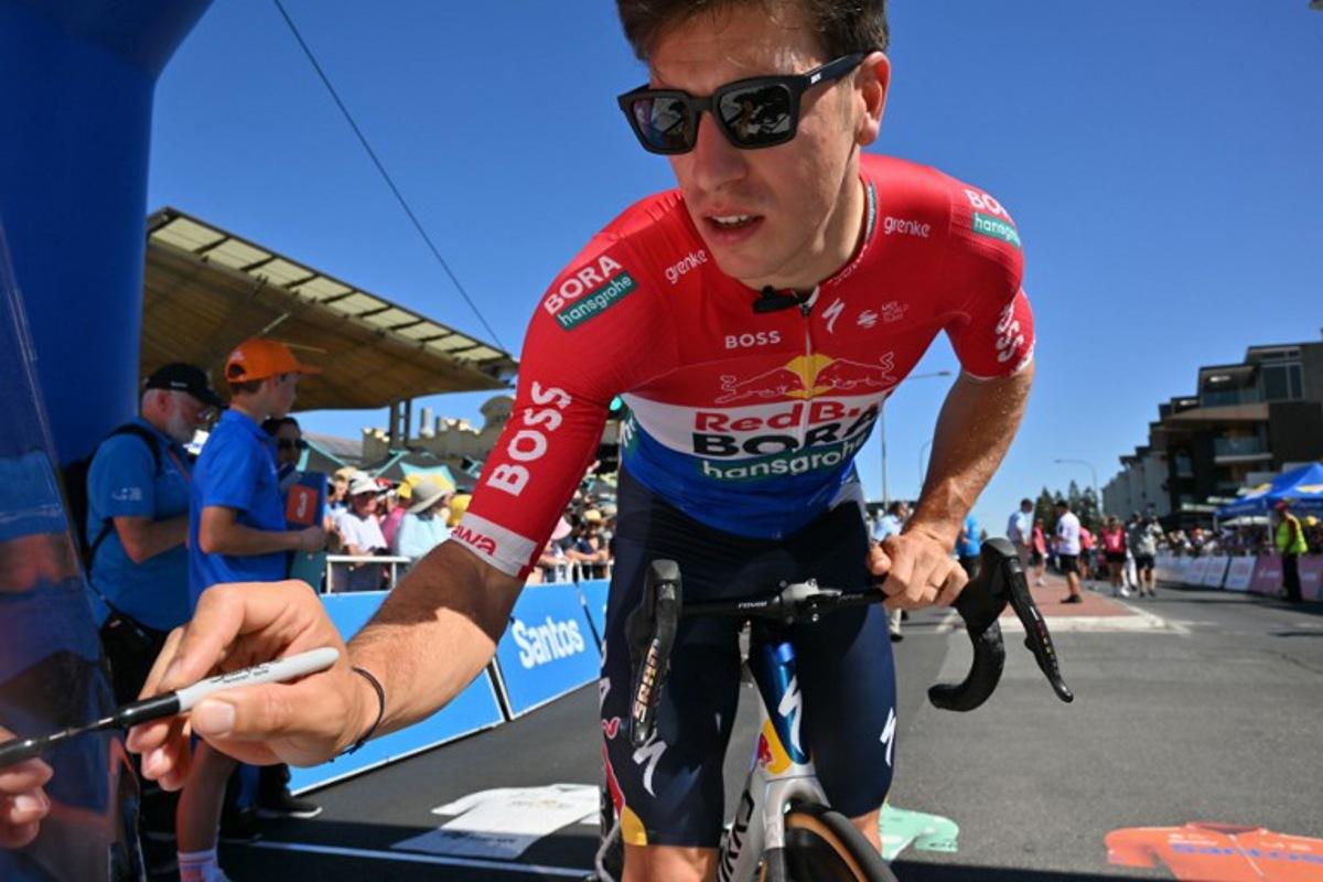 Red BullÐBoraÐHansgrohe rider Danny van Poppel of Netherlands signs on prior to the start of stage three of the Tour Down Under UCI Men's Cycling race in Adelaide on January 23, 2026. Brenton Edwards / AFP