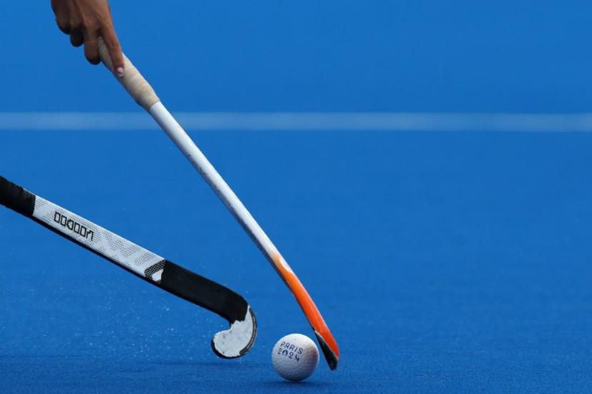 Players fight for the ball in the women's pool A field hockey match between the Netherlands and Japan during the Paris 2024 Olympic Games at the Yves-du-Manoir Stadium in Colombes on August 3, 2024. Ahmad GHARABLI / AFP