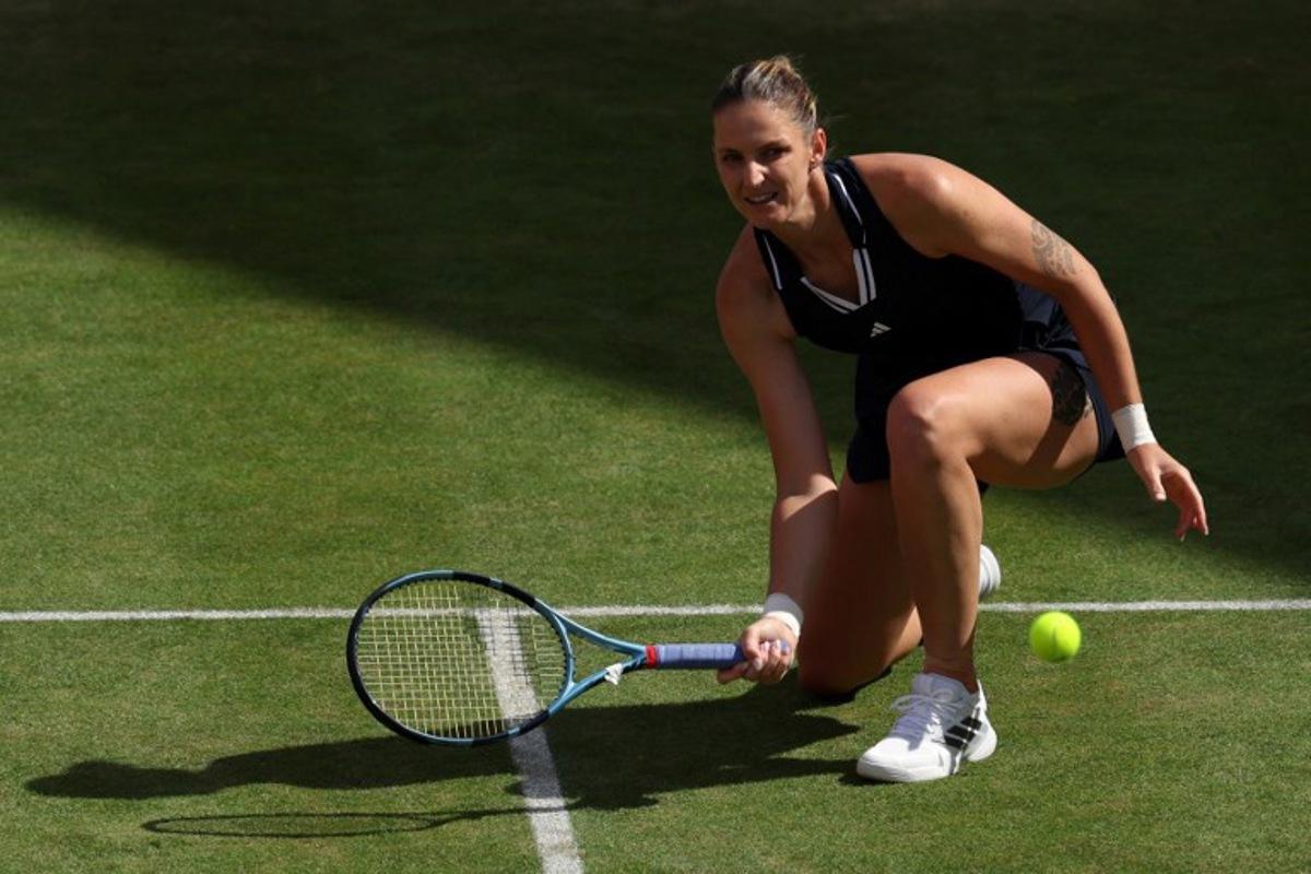 Czech Republic's Karolina Pliskova returns against Croatia's Donna Vekic during their women's singles quarter-final tennis match at the HSBC WTA Championships at Queen's Club in west London on June 12, 2026. Adrian Dennis / AFP
