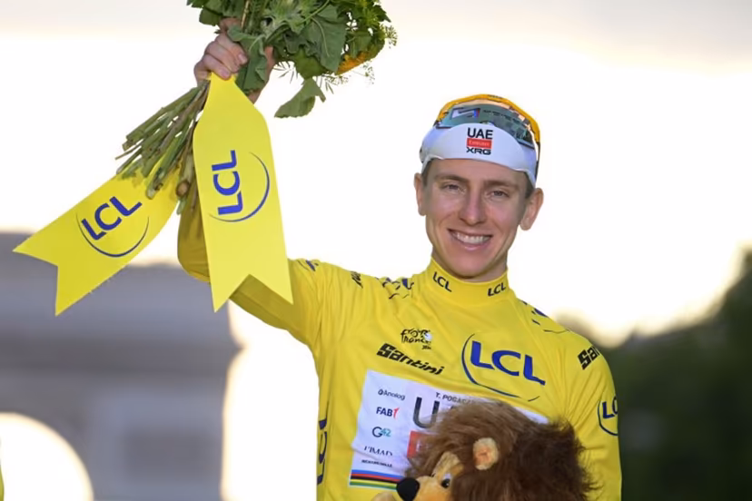 UAE Team Emirates - XRG's Slovenian rider Tadej Pogacar celebrates on the podium with the overall leader's yellow jersey after the 21st stage of the 113th edition of the Tour de France cycling race, 88,7 km starting and finishing in Paris, on July 26, 2026. Bernard PAPON / POOL / AFP