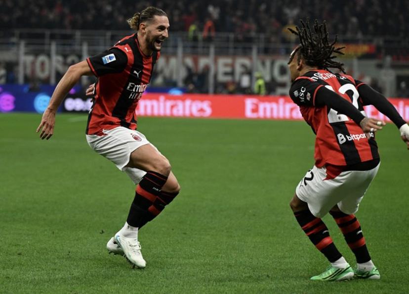 AC Milan's French midfielder #12 Adrien Rabiot (L) celebrates with AC Milan's Belgian midfielder #22 Diego Moreira (R) after scoring his team's second goal during the Italian Serie A football match between AC Milan and Inter Milan at the San Siro (Giuseppe Meazza) stadium in Milan, on October 31, 2026. Stefano Rellandini / AFP