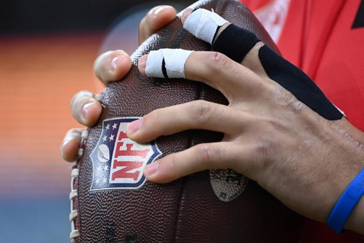 Kansas City Chiefs quarterback Patrick Mahomes warms up with the ball prior to the NFL game between Miami Dolphins and Kansas City Chiefs at the Waldstadion in Frankfurt am Main, western Germany on November 5, 2023. Kirill KUDRYAVTSEV / AFP