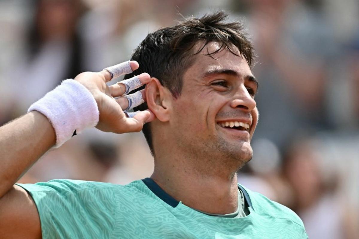 Argentine's Mariano Navone celebrates after winning the first set against Canada's Felix Auger Aliassime during the ATP Rome Open tennis tournament at Foro Italico in Rome on May 9, 2026. Filippo MONTEFORTE / AFP