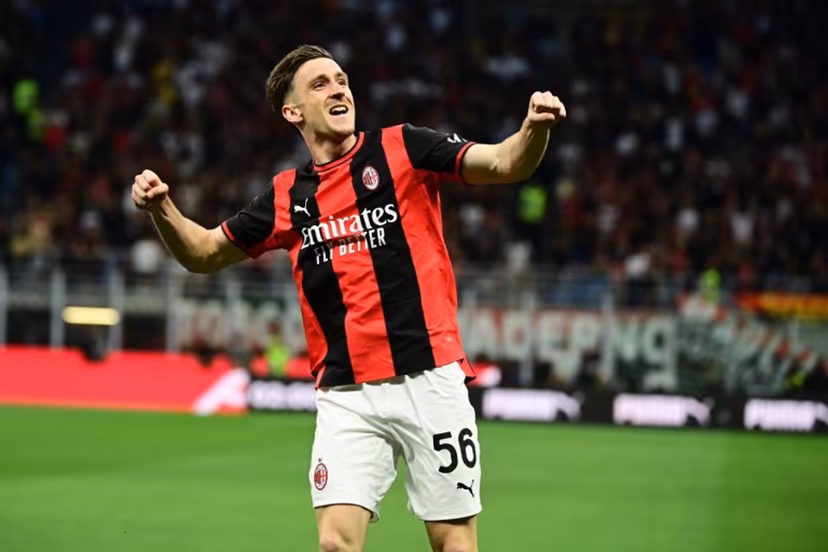 AC Milan's Belgian midfielder #56 Alexis Saelemaekers celebrates after scoring his team's first goal during the Italian Serie A football match between AC Milan and Cagliari at the San Siro Stadium in Milan on May 24, 2026. Piero CRUCIATTI / AFP