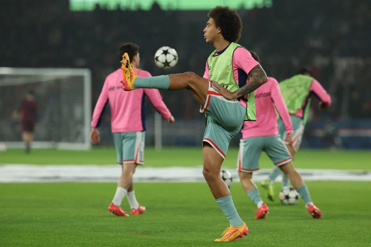 Atletico Madrid's Belgian midfielder #20 Axel Witsel warms up prior to the UEFA Champions League, League phase - Matchday 4, football match between Paris Saint-Germain (PSG) and Atletico Madrid, at the Parc des Princes stadium in Paris on November 6, 2024. FRANCK FIFE / AFP