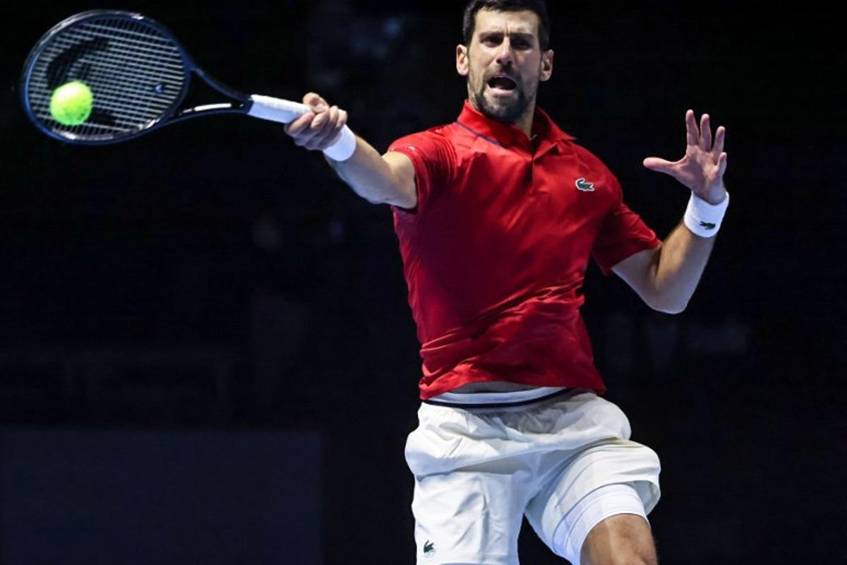 Serbia's Novak Djokovic hits a return against US' Taylor Fritz during the third-placed match at the Six Kings Slam exhibition tennis tournament in Riyadh on October 18, 2025. Fayez NURELDINE / AFP