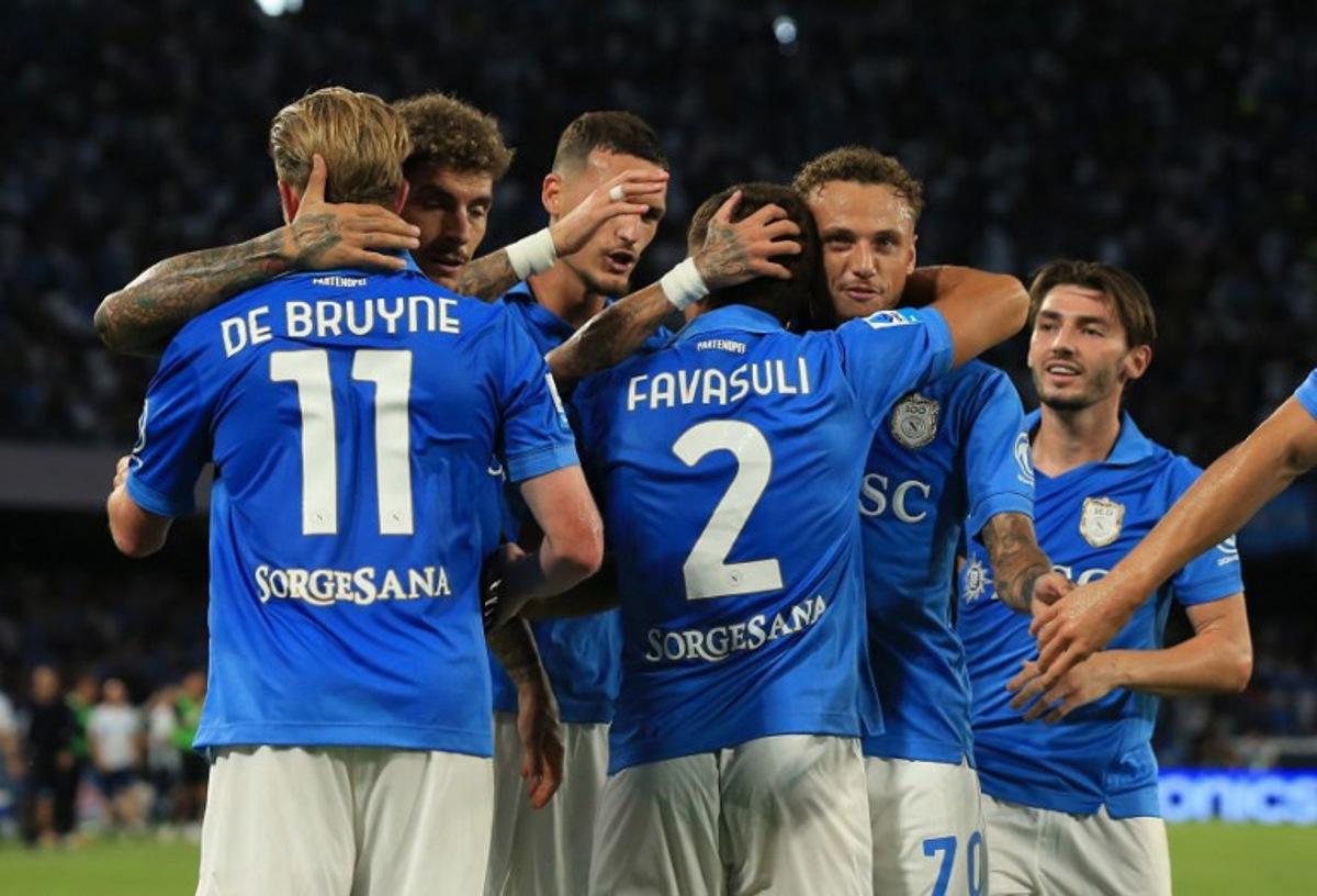 Napoli's players celebrate their team's first goal during the Italian Serie A football match SSC Napoli vs Bologna FC 1909 at the Diego Armando Maradona Stadium in Naples on September 13, 2026. CARLO HERMANN / AFP