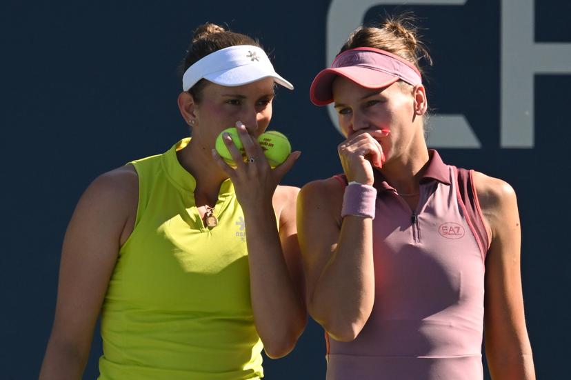 Belgian Elise Mertens (yellow) and Veronika Kudermetova (pink) pictured during a tennis match against US pair Brantmeier-Hamilton, in the second round of the women's doubles of the 2025 US Open Grand Slam tennis tournament in New York City, USA, Saturday 30 August 2025. BELGA PHOTO TONY BEHAR
