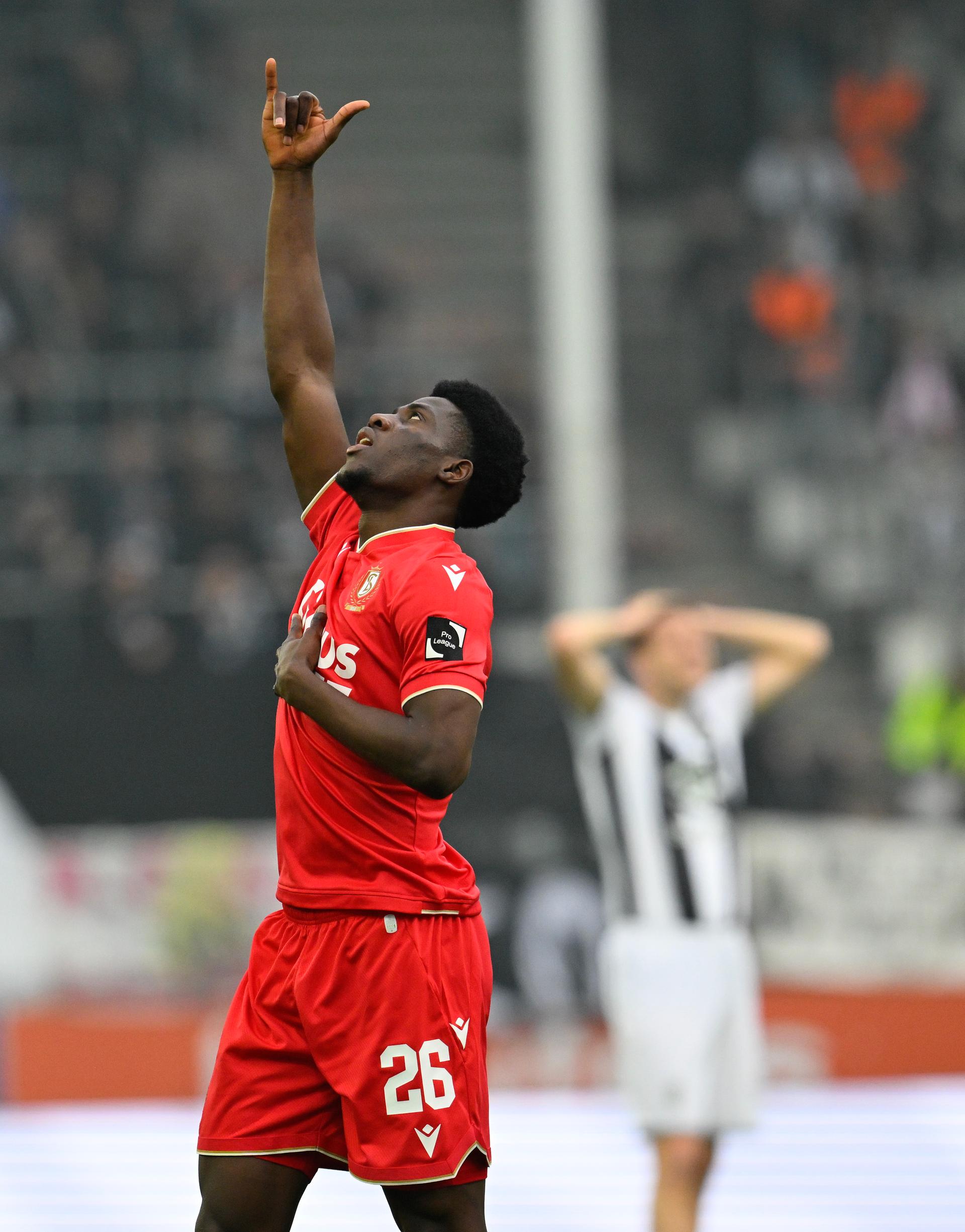 Standard's Bernard Nguene celebrates after scoring during a soccer match between Sporting Charleroi and Standard de Liege, Saturday 18 April 2026 in Charleroi, on the third day of the Europe Play-offs (PO2) of the 2025-2026 'Jupiler Pro League' first division of the Belgian championship. BELGA PHOTO JOHN THYS