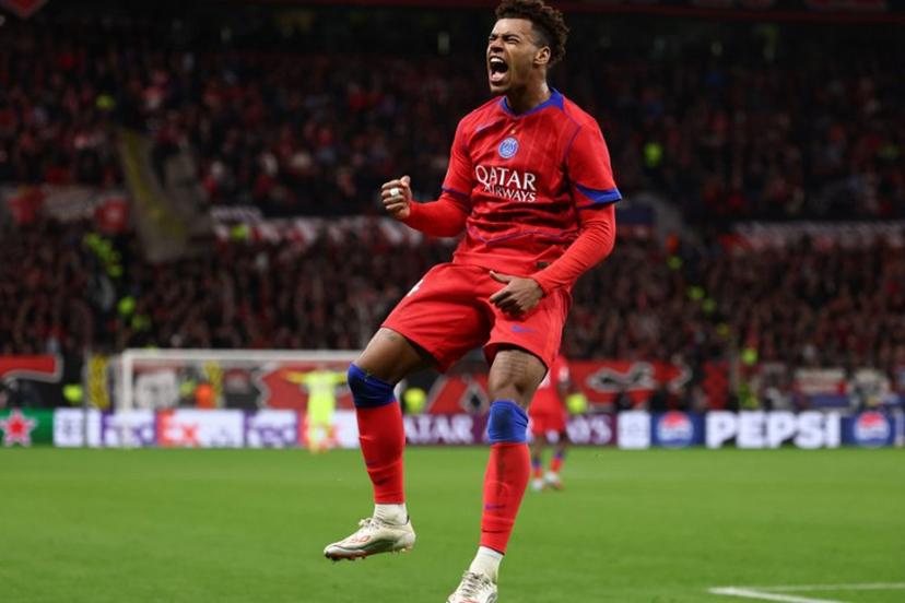 Paris Saint-Germain's French midfielder #14 Desire Doue celebrates scoring the 1-4 goal during the UEFA Champions League football match between Bayer 04 Leverkusen and Paris Saint-Germain (PSG) at the BayArena stadium in Leverkusen, western Germany on October 21, 2025.  FRANCK FIFE / AFP