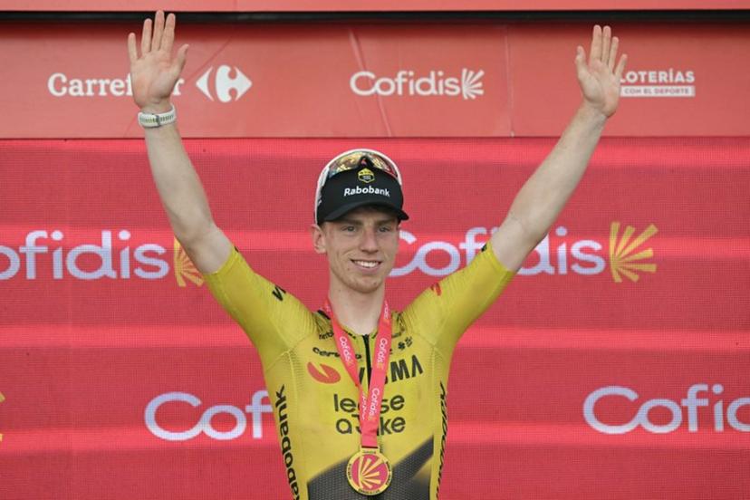 Team Visma-Lease a bike's British rider Matthew Brennan celebrates on the podium after winning the 17th stage of the Vuelta a Espana 2026 cycling tour, a 185 km race between Dos Hermanas and Seville, on September 9, 2026. JORGE GUERRERO / AFP