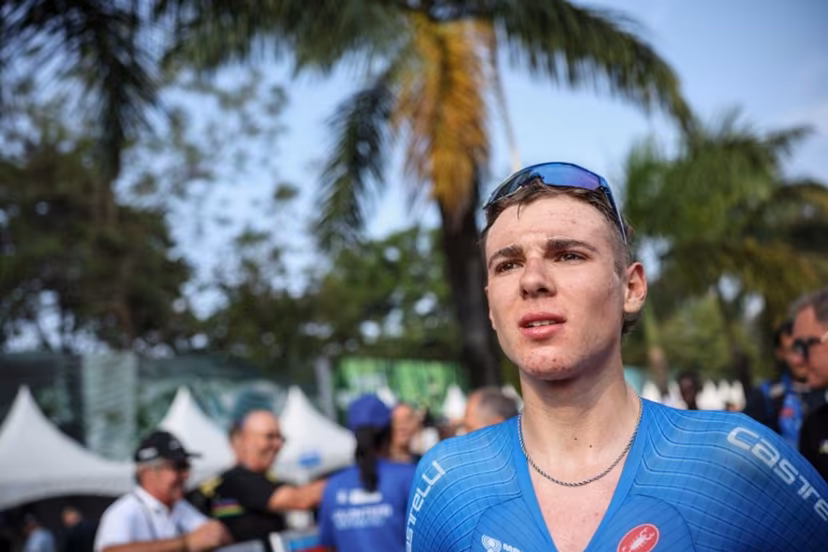 Italian rider Lorenzo Mark Finn reacts after winning the men's U23 road race cycling event during the UCI 2025 Road World Championships, in Kigali, on September 26, 2025. Anne-Christine POUJOULAT / AFP
