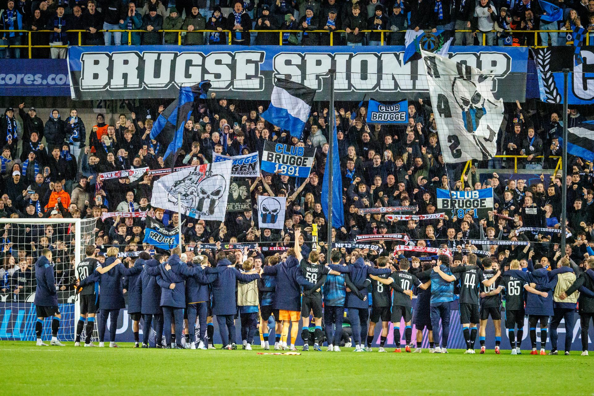 Club's supporters Club's players celebrate after winning a soccer game between Belgian Club Brugge KV and French Racing Club de Lens, Wednesday 21 October 2026 in Brugge, on day three of the UEFA Champions League league phase. BELGA PHOTO KURT DESPLENTER