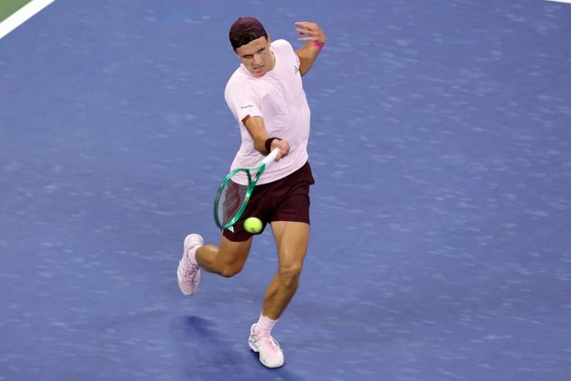 Czech Republic's Jakub Mensik hits a return to USA's Learner Tien during their men's singles third round tennis match on day seven of the US Open tennis tournament at the USTA Billie Jean King National Tennis Center in New York City on September 5, 2026. KENA BETANCUR / AFP