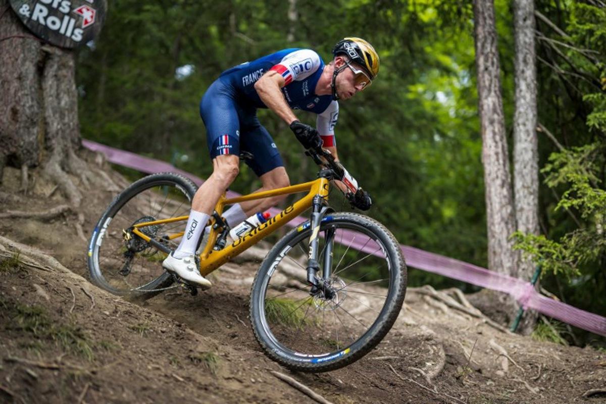 France's Mathis Azzaro competes during the Men's elite Cross-country Olympic race as part of the 2025 UCI Mountain Bike World Championships in Crans-Montana on September 14, 2025. Fabrice COFFRINI / AFP