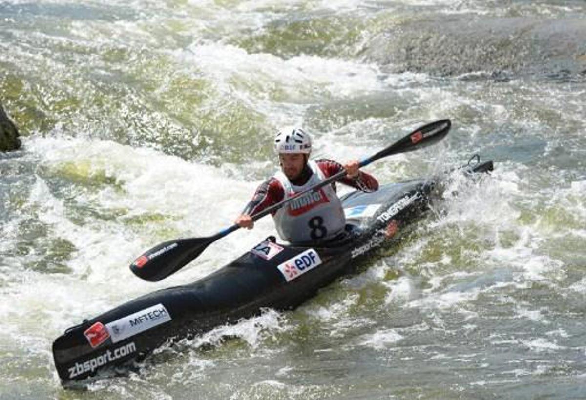 French Theo Devard competes in the Kayak K1 men race at the ICF Wildwater Canoeing Sprint World in the southern German city of Augsburg, on June 12, 2011. AFP PHOTO/CHRISTOF STACHE