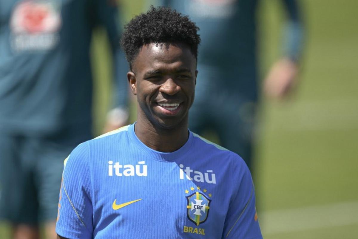 Brazil's forward Vinicius Junior smiles on during a training session as part of the team's preparation for its FIFA World Cup football tournament opening match against Morocco at Columbia Park Training Facility in Morristown, New Jersey on June 9, 2026. MAURO PIMENTEL / AFP