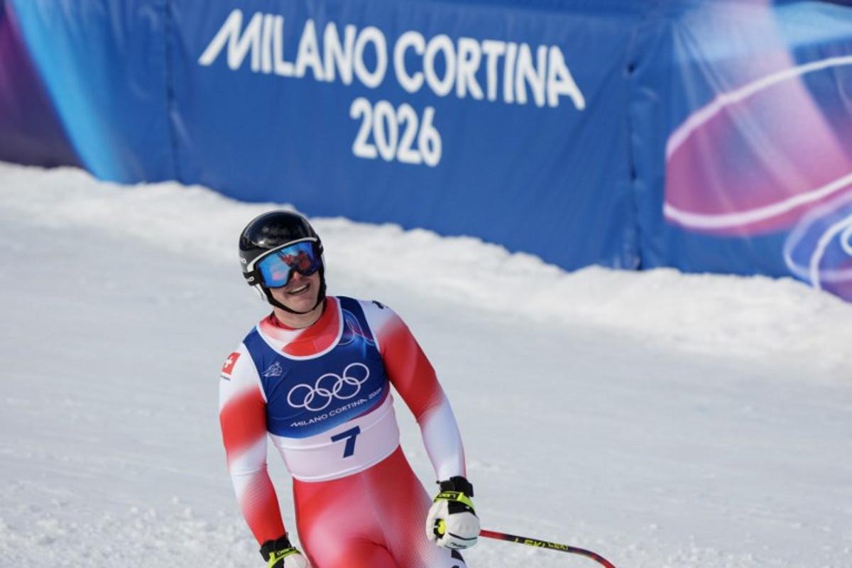Switzerland's Franjo von Allmen reacts in the finish area of the men's super-G alpine skiing event during the Milano Cortina 2026 Winter Olympic Games at the Stelvio Ski Centre in Bormio (Valtellina) on February 11, 2026. Dimitar DILKOFF / AFP