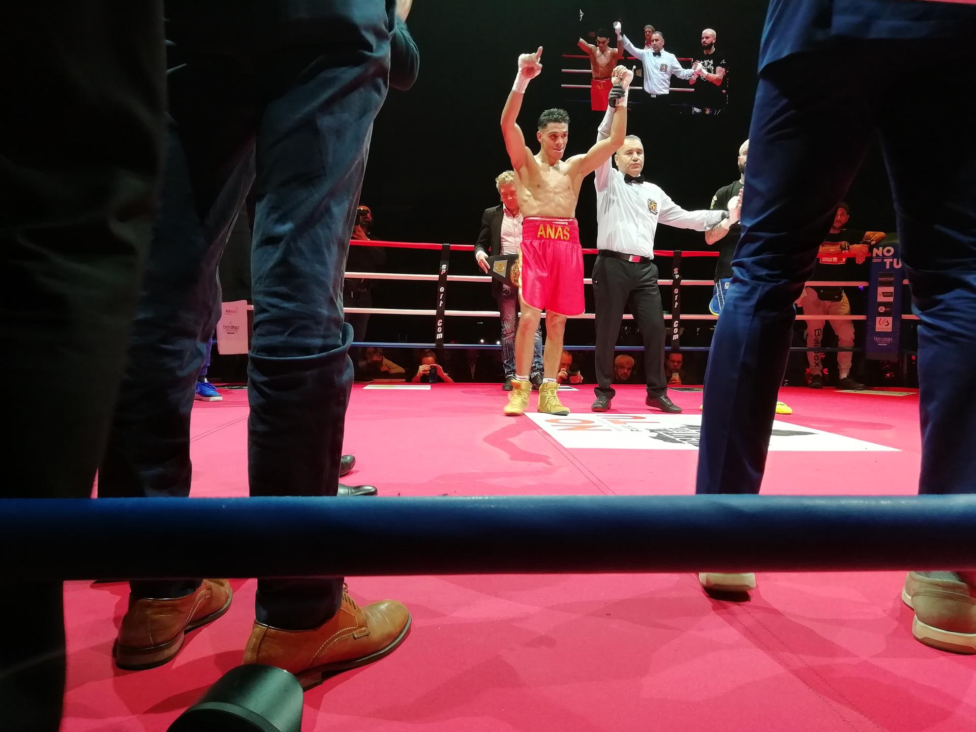 Anas Messaoudi celebrates after winning the fight against Cedric Peynaud (R) for the Benelux Welters title, Saturday 11 January 2020 in Brussels. BELGA PHOTO GERARD CERF