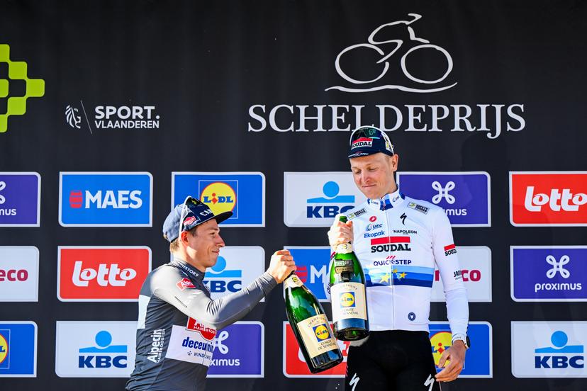 Belgian Jasper Philipsen of Alpecin-Deceuninck and Belgian Tim Merlier of Soudal Quick-Step celebrates on the podium after winning the men's race of the 113th edition of the 'Scheldeprijs' one day cycling event, 202,8 km from Terneuzen, the Netherlands to Schoten, Belgium on Wednesday 09 April 2025. BELGA PHOTO TOM GOYVAERTS