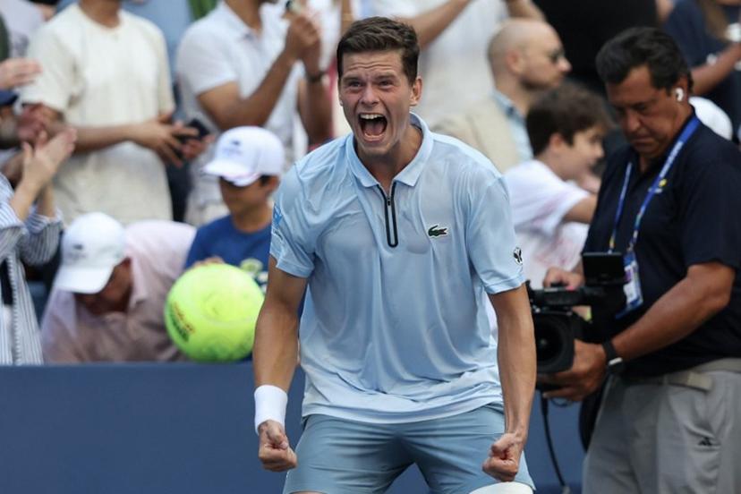 Belgium's Alexander Blockx celebrates defeating Italy's Flavio Cobolli during at the end of their men's singles third round tennis match on day seven of the US Open tennis tournament at the USTA Billie Jean King National Tennis Center in New York City on September 5, 2026. TIMOTHY A. CLARY / AFP