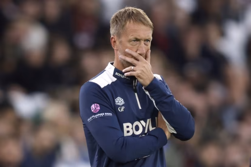 (FILES) West Ham United's English head coach Graham Potter looks on the touchline withe the score at 0-3 in the second half during the English Premier League football match between West Ham United and Tottenham Hotspur at the London Stadium, in London on September 13, 2025. Graham Potter has been dismissed by West Ham after only nine months, the club announced on its website, Saturday September 27. Ian Kington / AFP