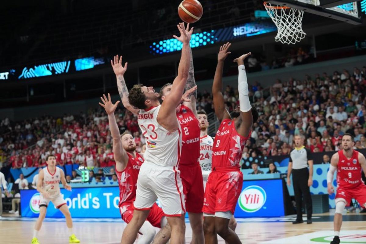 Turkey's power forward #23 Alperen Sengun vies for the ball during the FIBA EuroBasket 2025 quarter-final basketball match between Turkey and Poland in Riga, Latvia, on September 9, 2025. Gints Ivuskans / AFP