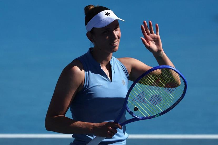 Belgium's Elise Mertens celebrates victory over Japan's Moyuka Uchijima after their women's singles match on day five of the Australian Open tennis tournament in Melbourne on January 22, 2026. Martin KEEP / AFP