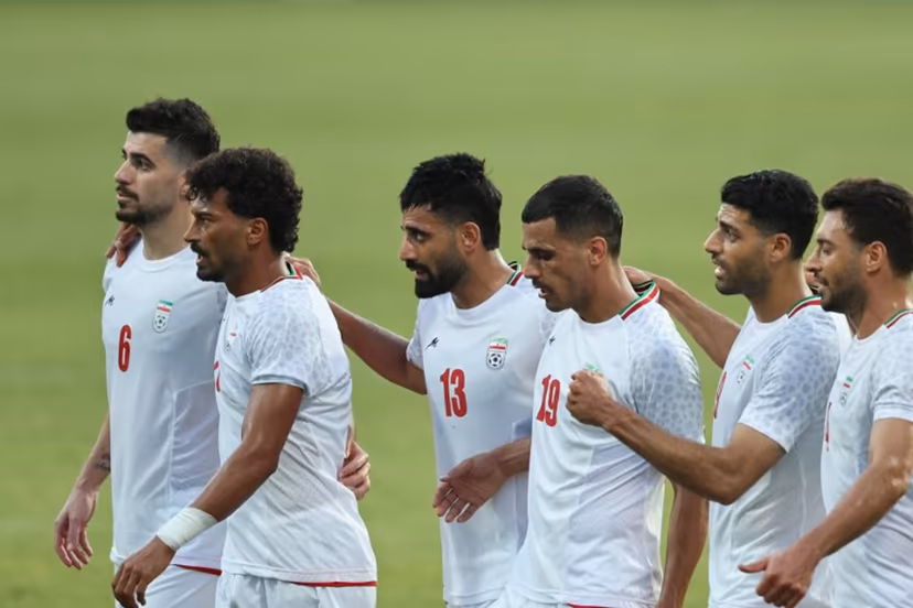 Iran's Forward #23 Ramin Rezaeian celebrates with teammates after scoring their side's second goal during an international friendly football match between Iran and Gambia, in Antalya, southern Turkey, May 29, 2026, as part of Iran's preparation for the upcoming football World Cup. Oner SAN / AFP