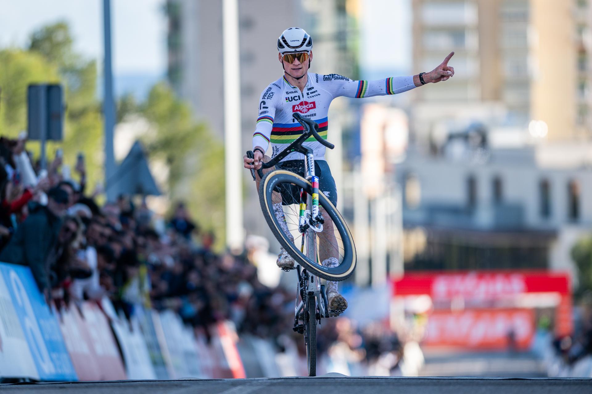 Dutch Mathieu Van Der Poel celebrates as he crosses the finish line to win the Men's Elite race at the cyclocross cycling event in Benidorm, Spain, Sunday 18 January 2026, stage 10/12 in the UCI World Cup competition. BELGA PHOTO DAVID PINTENS