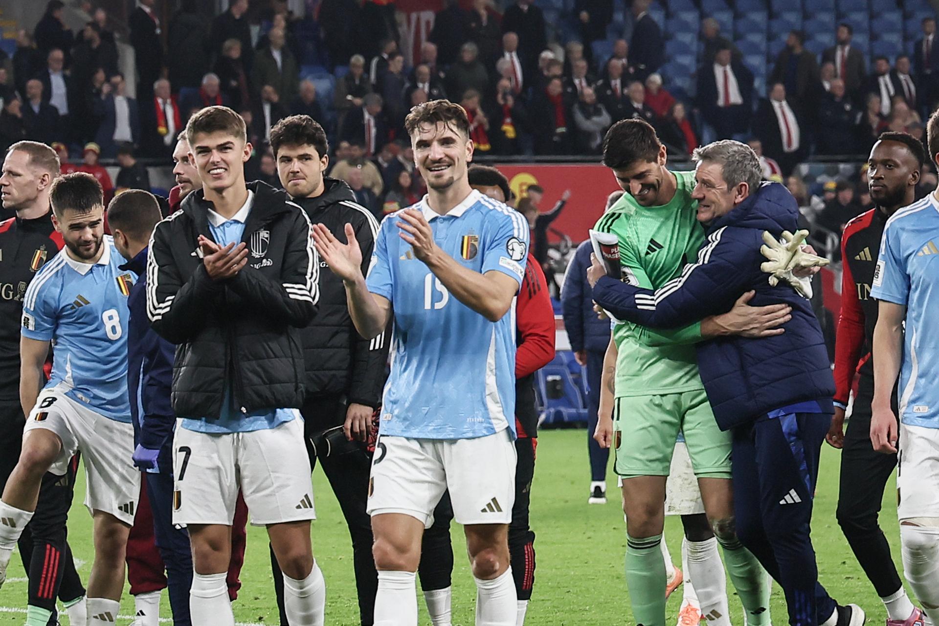 Belgium's players celebrate after winning a soccer game between Wales and Belgian national team Red Devils, in Cardiff, Wales on Sunday 12 October 2025, qualifier 6/8 for the 2026 FIFA World Cup. BELGA PHOTO BRUNO FAHY