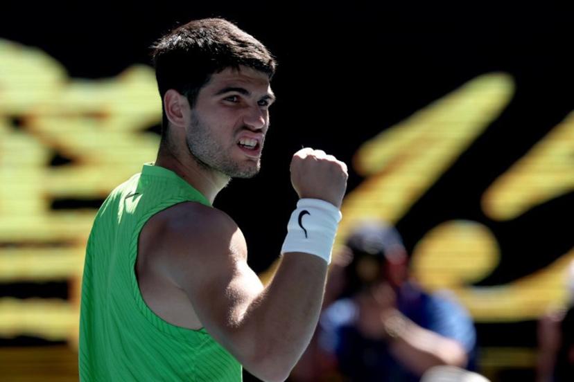 Spain's Carlos Alcaraz celebrates victory over France's Corentin Moutet after their men's singles match on day six of the Australian Open tennis tournament in Melbourne on January 23, 2026. DAVID GRAY / AFP