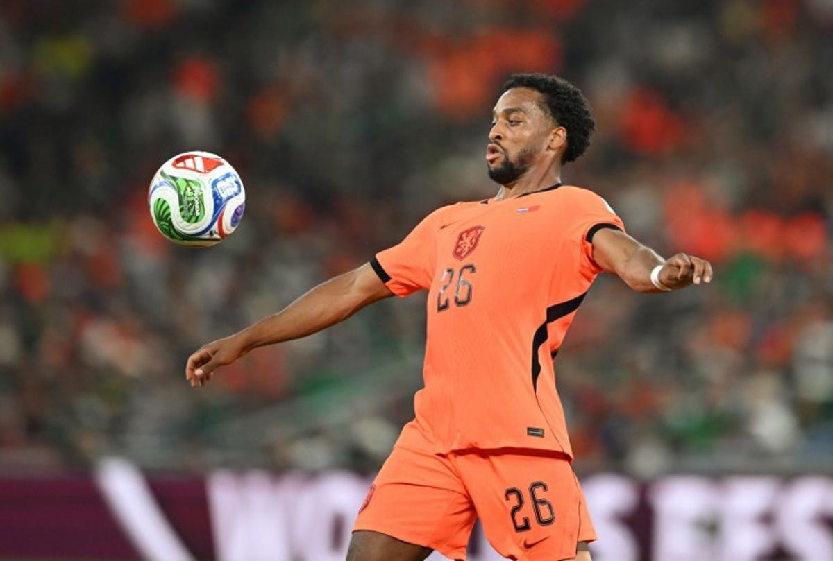 Netherlands' midfielder #26 Quinten Timber controls the ball during the 2026 World Cup round of 32 football match between the Netherlands and Morocco at the Monterrey Stadium in Guadalupe on June 29, 2026. CARL DE SOUZA / AFP