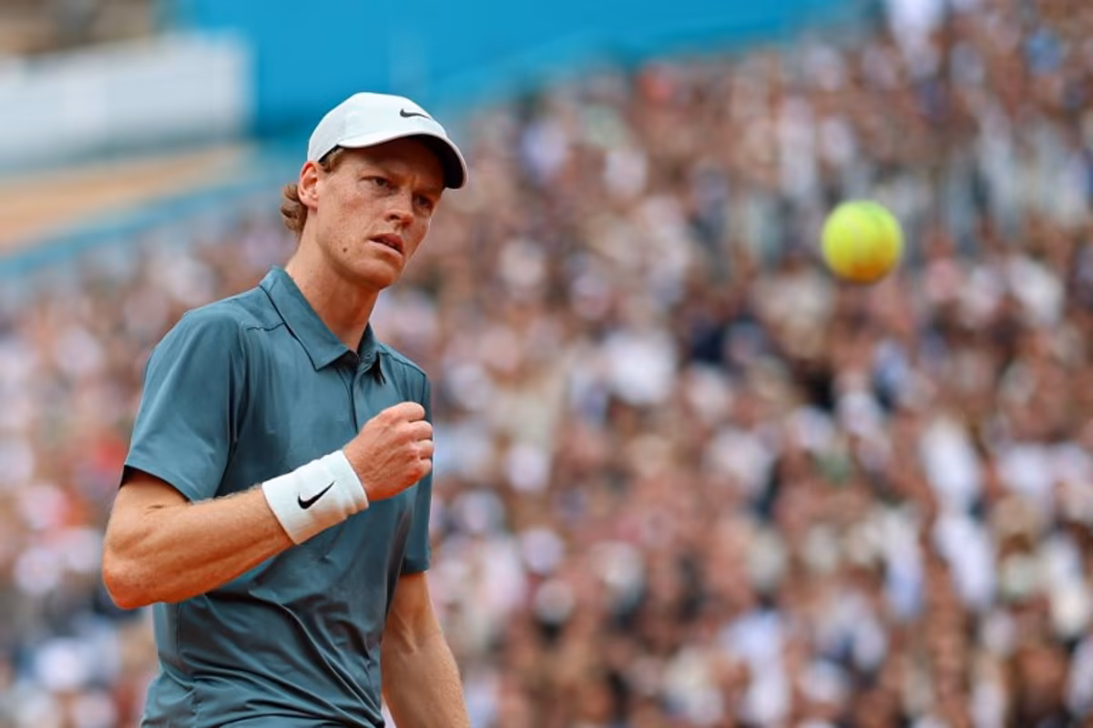 Italy's Jannik Sinner reacts as he plays against Spain's Carlos Alcaraz during the Monte Carlo ATP Masters Series Tournament final tennis match on Court Rainier III at the Monte-Carlo Country Club in Roquebrune-Cap-Martin, south-eastern France on April 12, 2026. Valery HACHE / AFP