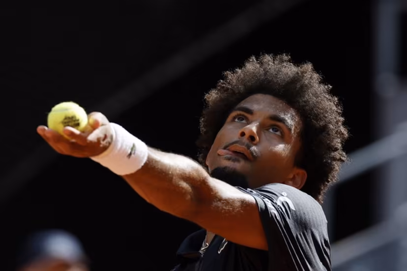 France's Arthur Fils serves to Italy's Jannik Sinner during their 2026 ATP Tour Madrid Open tennis tournament semi-final singles match at the Caja Magica in Madrid, on May 1, 2026. Oscar DEL POZO / AFP