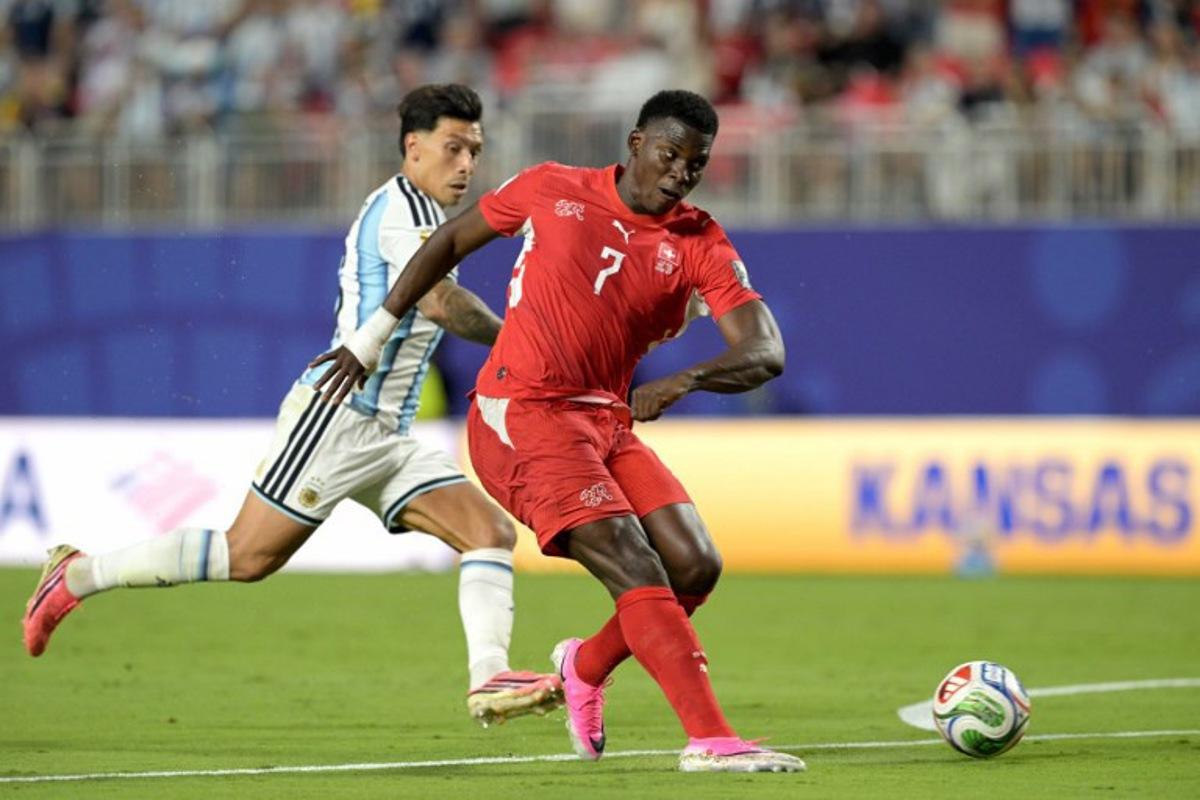 Switzerland's forward #07 Breel Embolo controls the ball during the 2026 World Cup football tournament quarter-final match between Argentina and Switzerland at the Kansas City Stadium in Kansas City on July 11, 2026. JUAN MABROMATA / AFP