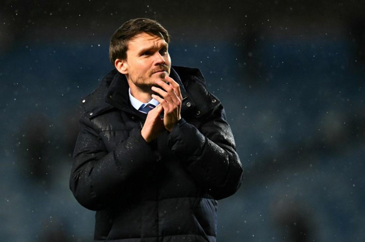 Rangers' German head coach Danny Rohl applauds the fans following the UEFA Europa League, league-stage football match between Rangers and Ludogorets Razgrad at the Ibrox Stadium in Glasgow on January 22, 2026. ANDY BUCHANAN / AFP