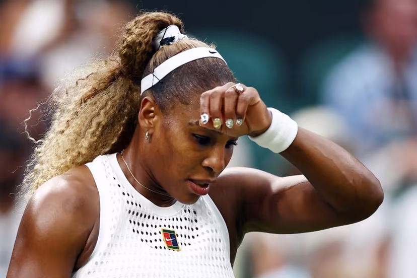 US player Serena Williams reacts as she plays against Australia's Maya Joint during their women's singles first round tennis match on the second day of the 2026 Wimbledon Championships at The All England Lawn Tennis and Croquet Club in Wimbledon, southwest London, on June 30, 2026. HENRY NICHOLLS / AFP