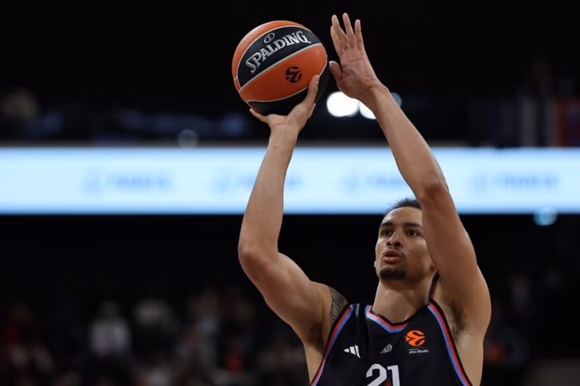Paris Basketball's Belgian pivot #21 Ismael Bako performs a free throw during the Euroleague basketball match between Paris Basketball and Virtus Bologna at the Adidas Arena, in Paris, on October 9, 2025.  Anne-Christine POUJOULAT / AFP