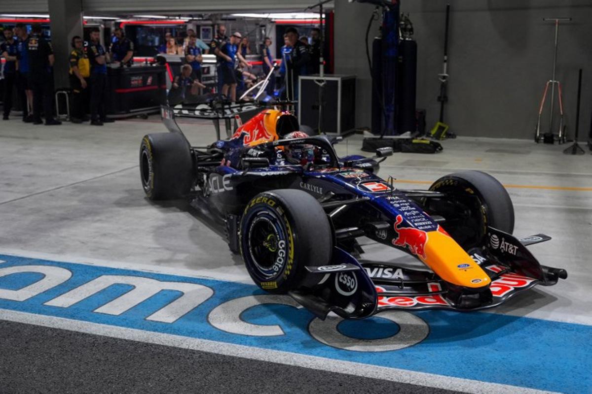 Red Bull Racing's Dutch driver Max Verstappen drives in the pits during the sprint qualifying session ahead of the Formula One Singapore Grand Prix at the Marina Bay Street Circuit in Singapore on October 9, 2026. Ng Han Guan / POOL / AFP