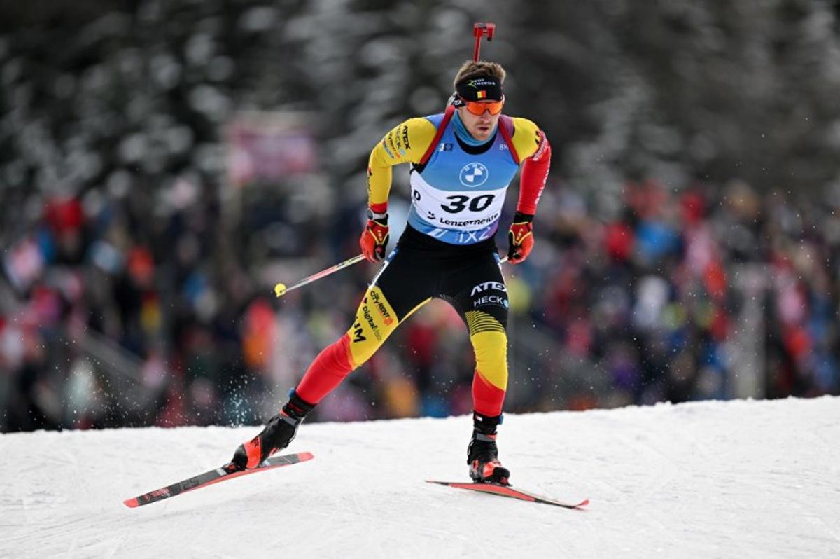 Belgium's Florent Claude competes in the men 10km sprint event of the IBU Biathlon World Cup in Lenzerheide, eastern Switzerland, on December 15, 2023. Fabrice COFFRINI / AFP