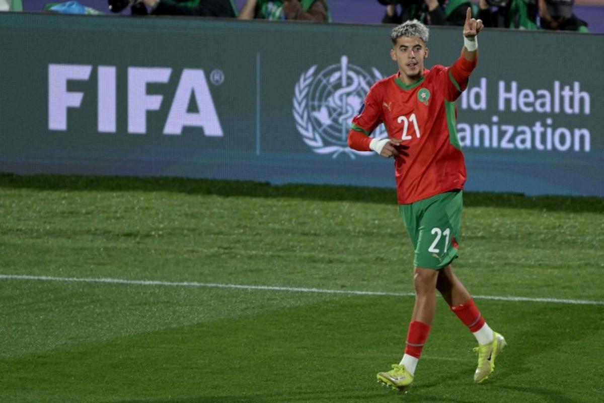 Morocco's forward #21 Yassir Zabiri celebrates scoring the opening goal during the 2025 FIFA U-20 World Cup final football match between Argentina and Morocco at the National Stadium in Santiago on October 19, 2025. Rodrigo ARANGUA / AFP