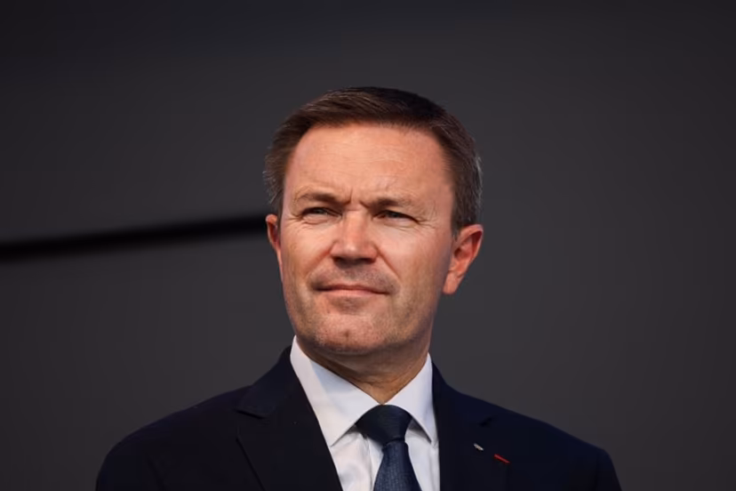 UCI President David Lappartient attends the medal ceremony following the men's Elite road race cycling event during the UCI 2025 Road World Championships, in Kigali, on September 28, 2025. Anne-Christine POUJOULAT / AFP