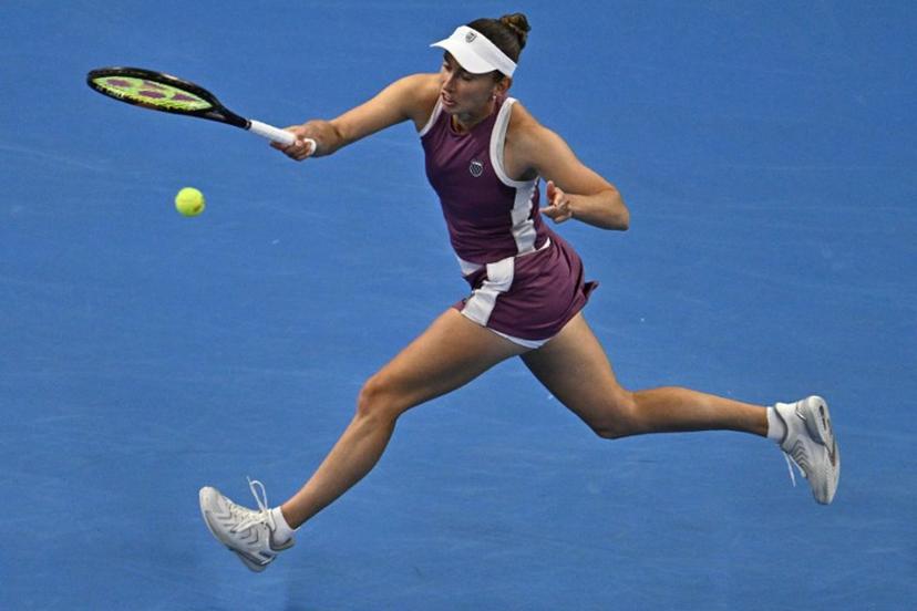Belgium's Elise Mertens hits a return to China's Zheng Qinwen during their women's singles semi-final at the China Open tennis tournament in Beijing on October 10, 2026. Pedro Pardo / AFP