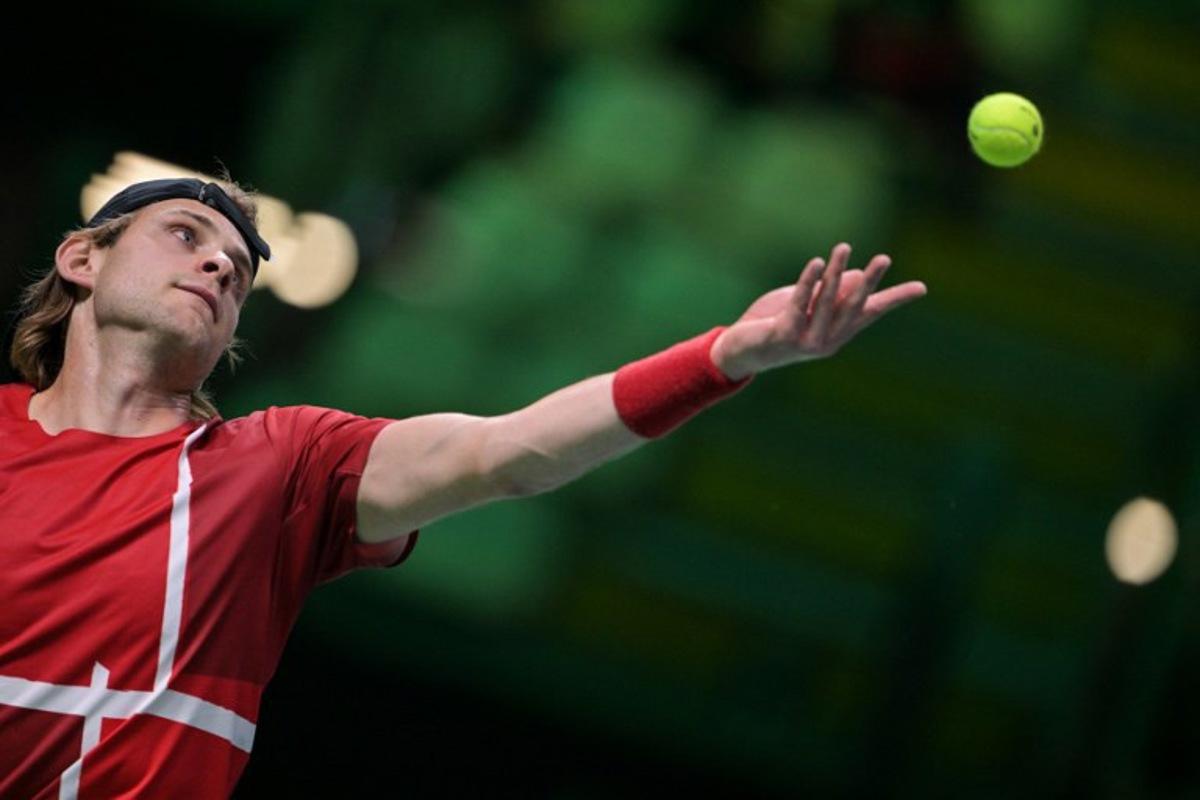 Belgium's Zizou Bergs serves the ball to France's Arthur Rinderknech during their Davis Cup men's singles quarter finals tennis match, at the Super Tennis Arena, in Bologna, northen Italy, on November 18, 2025. Tiziana FABI / AFP