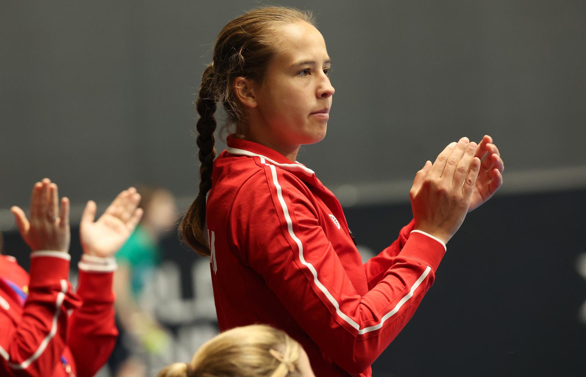Belgian Hanne Vandewinkel celebrates during a tennis match between Belgian Vandromme and French Cornet, on Friday 11 April 2025, the first game in the Promotion Play-offs between Belgium and France in the Europe/Africa Group I of the Billie Jean King Cup tennis, in Vilnius, Lithuania. PHOTO VIRGINIE LEFOUR