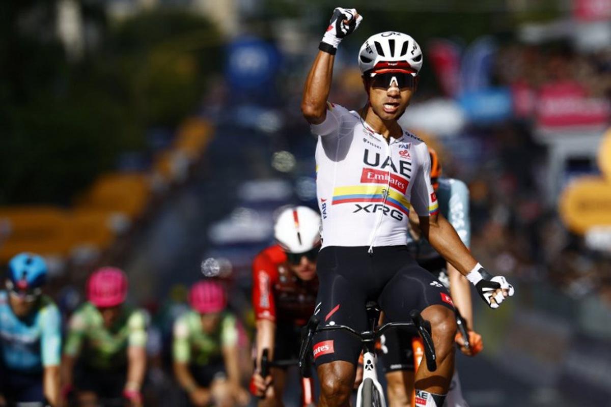 UAE Team Emirates - XRG Ecuadorian rider Jhonatan Narvaez celebrates as he crosses the finish line to win the 4th stage of the Giro d'Italia 2026 - Tour of Italy cycling race between Catanzaro and Cosenza, Italy, on May 12, 2026. Luca Bettini / AFP