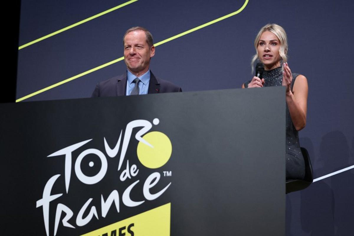 Director of the women's Tour de France cycling race Marion Rousse (R) speaks next to Tour de France General Director Christian Prudhomme during the presentation of the official routes of the 2026 edition of the men's and women's Tour de France cycling race in Paris on October 23, 2025. Anne-Christine POUJOULAT / AFP